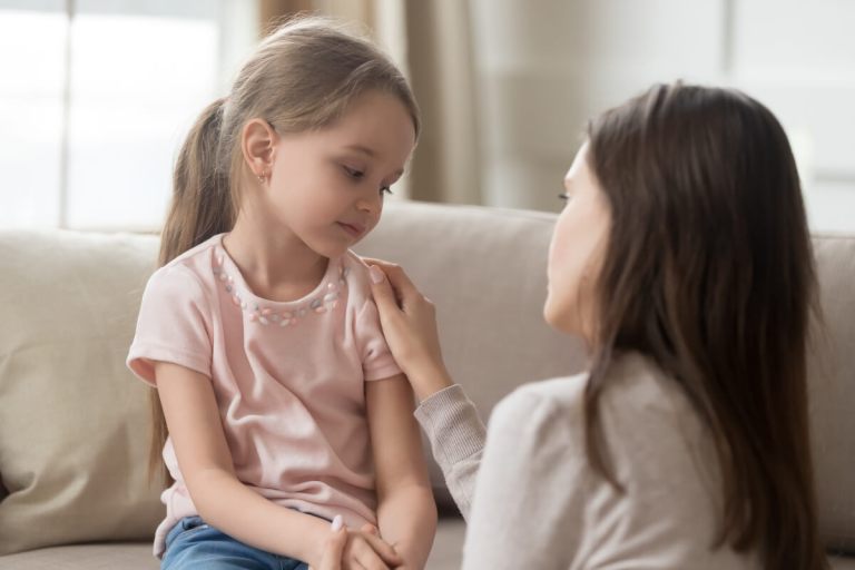 mother having talk with daughter