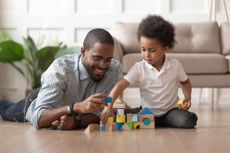 dad and son playing blocks