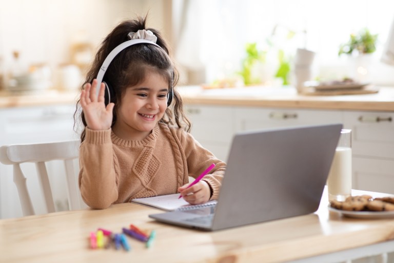 young girl with laptop