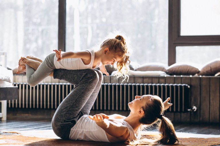 mom and daughter yoga