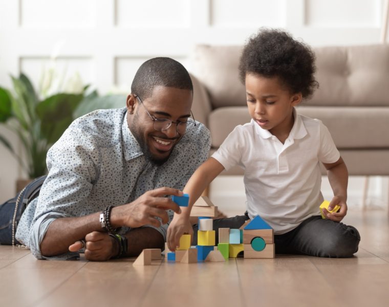 dad and son playing blocks